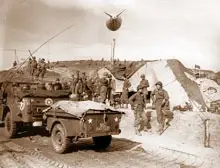 A balloon flown by the 320th protects the E-3 exit at Omaha Beach on D+2 (Easy Red sector)